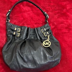 Black and gold Michael Kors bag